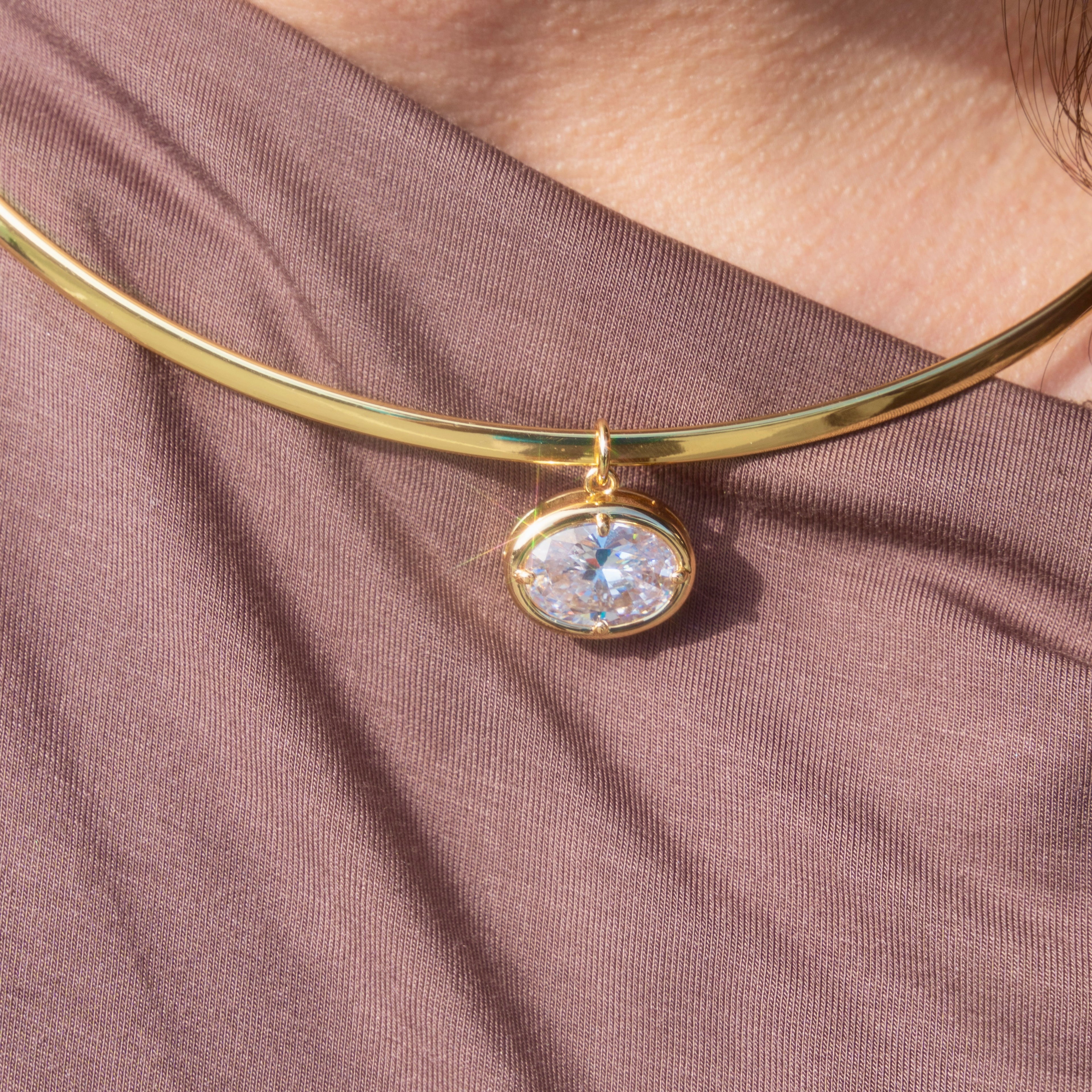 Gold Omega with Large Oval Charm