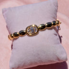 14k Oval Diamond Bangle
