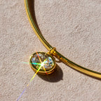 Gold Omega with Large Oval Charm
